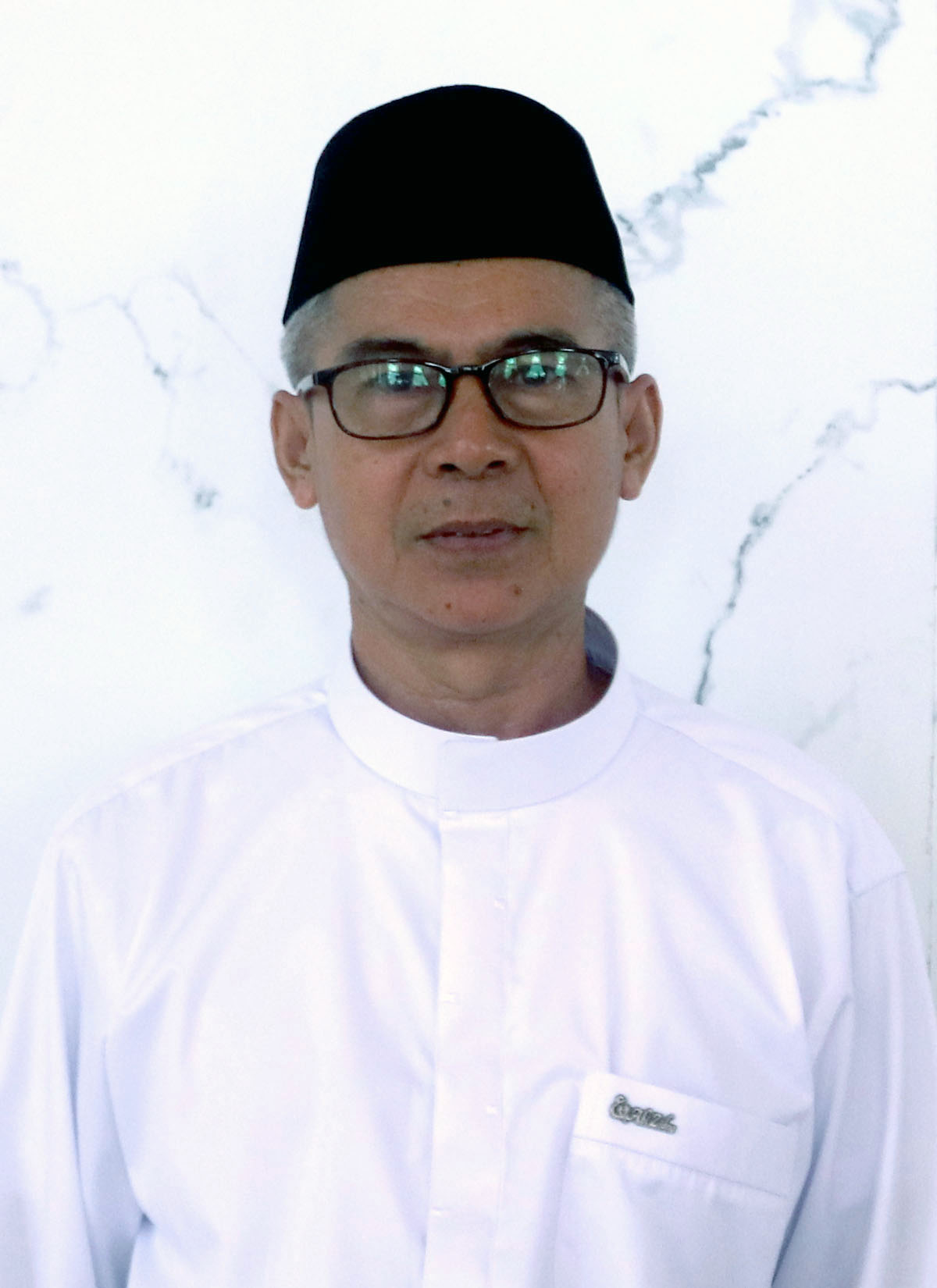 Drs. H. Asy'ari, M.Pd